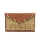 Valentino Garavani Rockstud Raffia Clutch Bag In Brown 28Cm