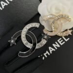 Chanel Cc Brooch Silver And Black With Two Small Stars - Image 4