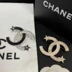 Chanel Cc Brooch Silver And Black With Two Small Stars - Image 3