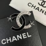 Chanel Cc Brooch Silver And Black With Two Small Stars - Image 2