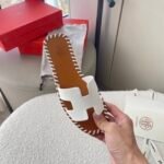 Hermès Oran Sandals Stitching In Brown And White - Image 5