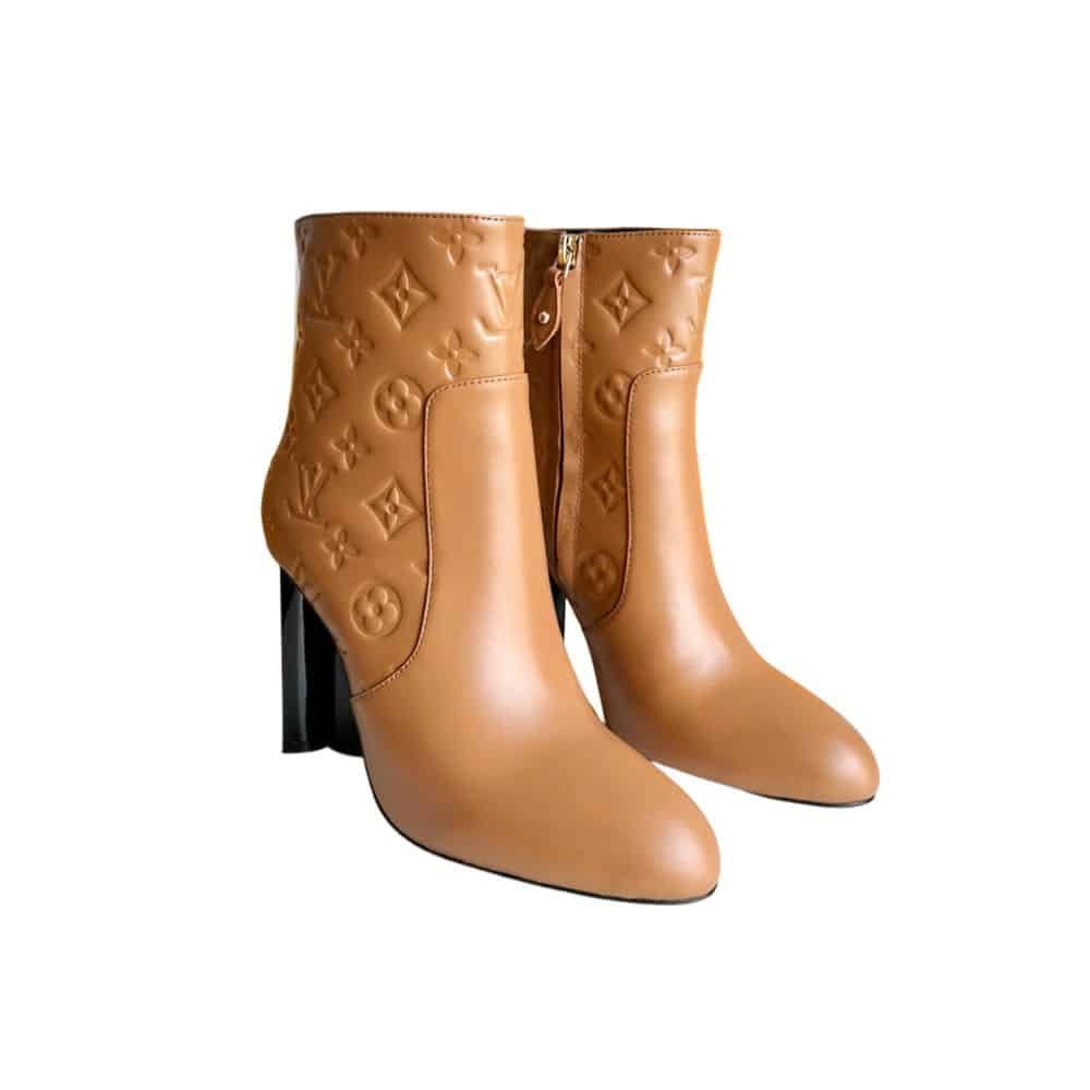 xr:d:DAFy0M-Gj-4:1152,j:1617202767428785789,t:23112709 Louis Vuitton Silhouette Ankle Boot Brown - Image 1