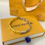 Louis Vuitton Monogram Tied Up Bracelet Gold And Silver M1306l - Image 3