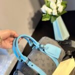 Louis Vuitton Keepall Bandoulière 25 Monogram Eclipse Reverse Coated Canvas Turquoise 25cm M11645 - Image 2