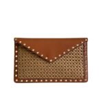 Valentino Garavani Rockstud Raffia Clutch Bag In Brown 28cm
