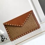 Valentino Garavani Rockstud Raffia Clutch Bag In Brown 28cm - Image 2